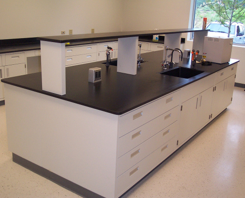side-by-side comparison of phenolic resin and epoxy resin laboratory countertop materials