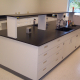 side-by-side comparison of phenolic resin and epoxy resin laboratory countertop materials